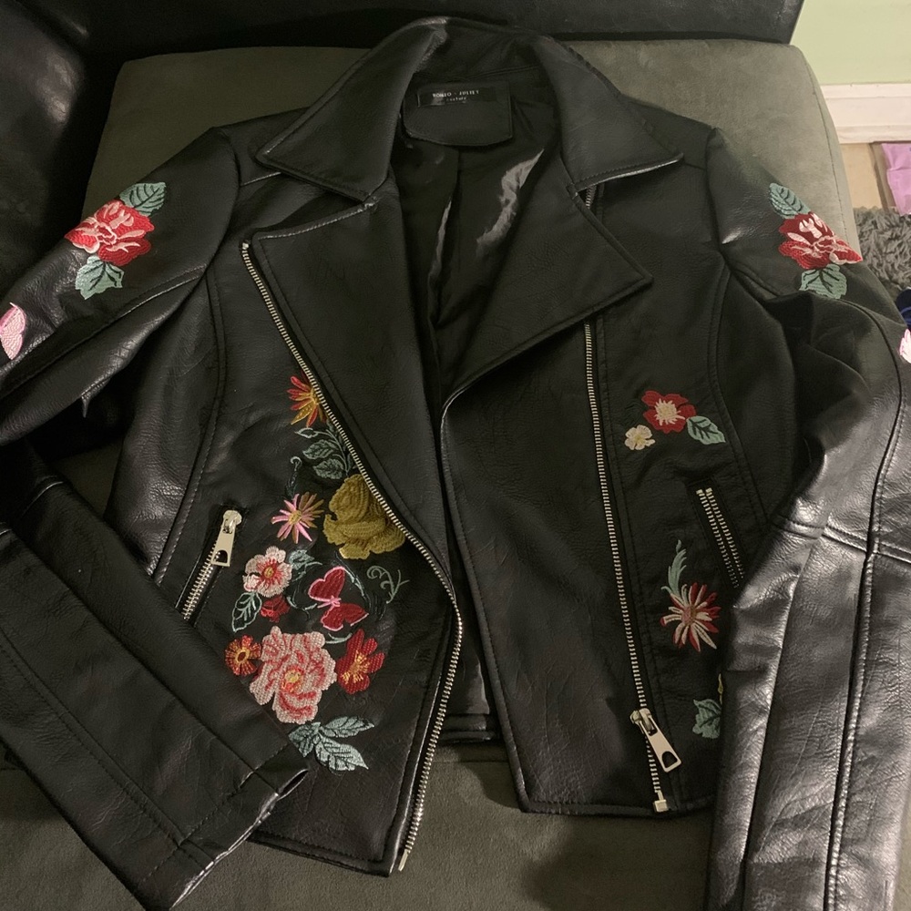 Black,leather,with flower patches,never used